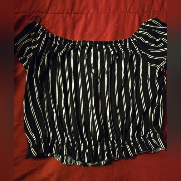 Cute off the shoulder black and white stripped blouse with elastic around waist. - Picture 5 of 5